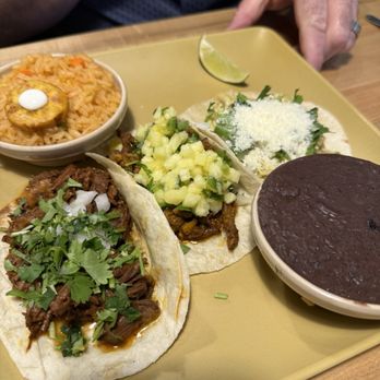 BelAir Cantina - Beef Birria taco, Al Pastor taco, and Pollo Verde taco with rice and black beans--really flavorful! - Tacos Near Me - Ashwaubenon, Wisconsin BelAir Cantina - Beef Birria taco, Al Pastor taco, and Pollo Verde taco with rice and black beans--really flavorful! - Tacos Near Me - Ashwaubenon, Wisconsin