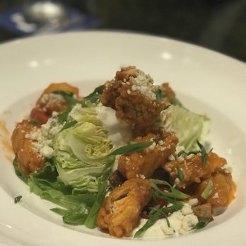 HK's Restaurant and Bar - Happy hour Buffalo Chicken Wedge Salad. Pretty big for happy hour - Steakhouses Near Me - Lake Ozark, Missouri