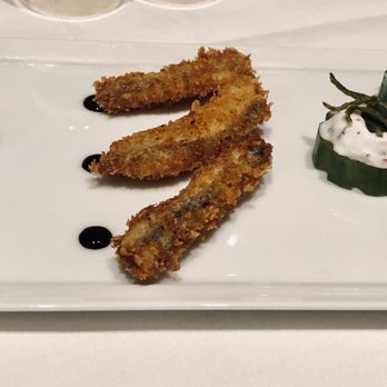 Laurent - Complimentary hors d'œuvres - tasty beef medallions, crispy fish with balsamic glaze, cucumber rounds with yogurt dressing. - French Near Me - Paris, 75