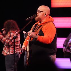 BridgeChurch - A worship leader sings during a Sunday.