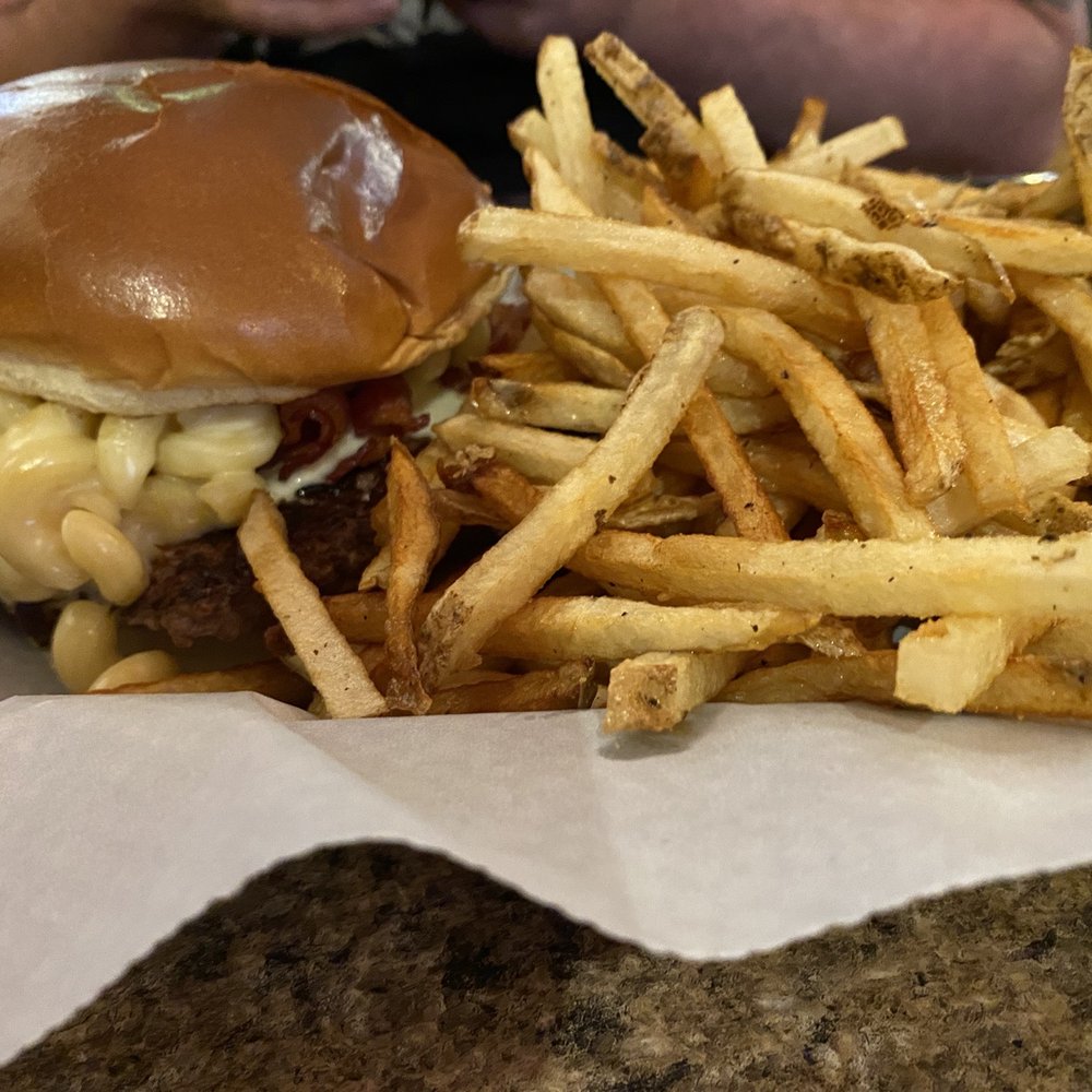 Troy's Bar And Grill - Mac n cheese burger with fries - American Near Me - Earling, Iowa Troy's Bar And Grill - Mac n cheese burger with fries - American Near Me - Earling, Iowa