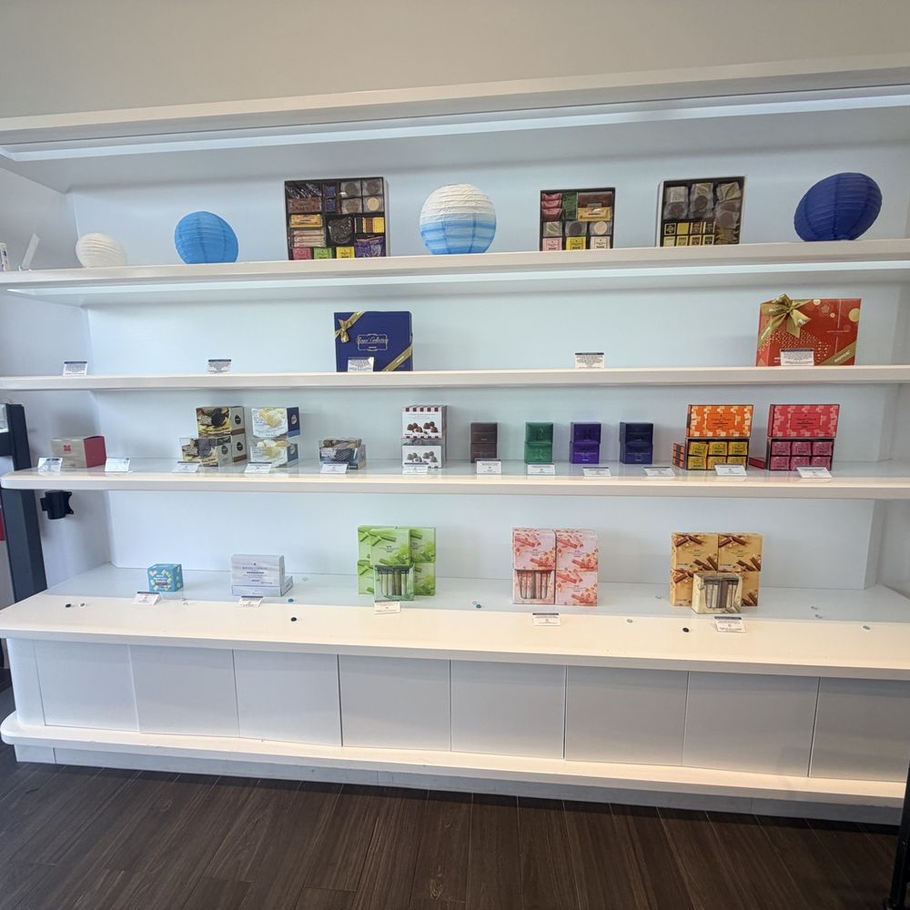 Community Experience: ROYCE' Chocolate - Chocolate display shelf - Yelp Events Near Me - Houston, Texas