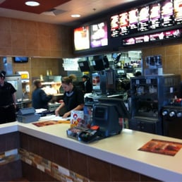 a woman working behind the counter