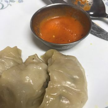 Nepal's Cafe - Steamed chicken dumplings aka momo - Indian Near Me - Estes Park, Colorado Nepal's Cafe - Steamed chicken dumplings aka momo - Indian Near Me - Estes Park, Colorado