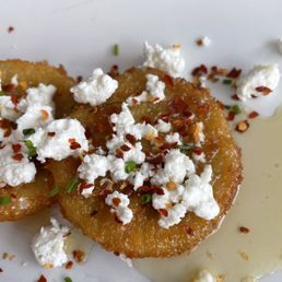 Fried green tomatoes with goat cheese and honey. If you get nothing else, get these Fried green tomatoes with goat cheese and honey. If you get nothing else, get these