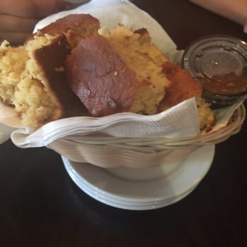 Famous Toastery - Cornbread served to you when u first sit down. It looked good, but it wasn't served hot and it was pretty dry. - Breakfast & Brunch Near Me - Concord, North Carolina