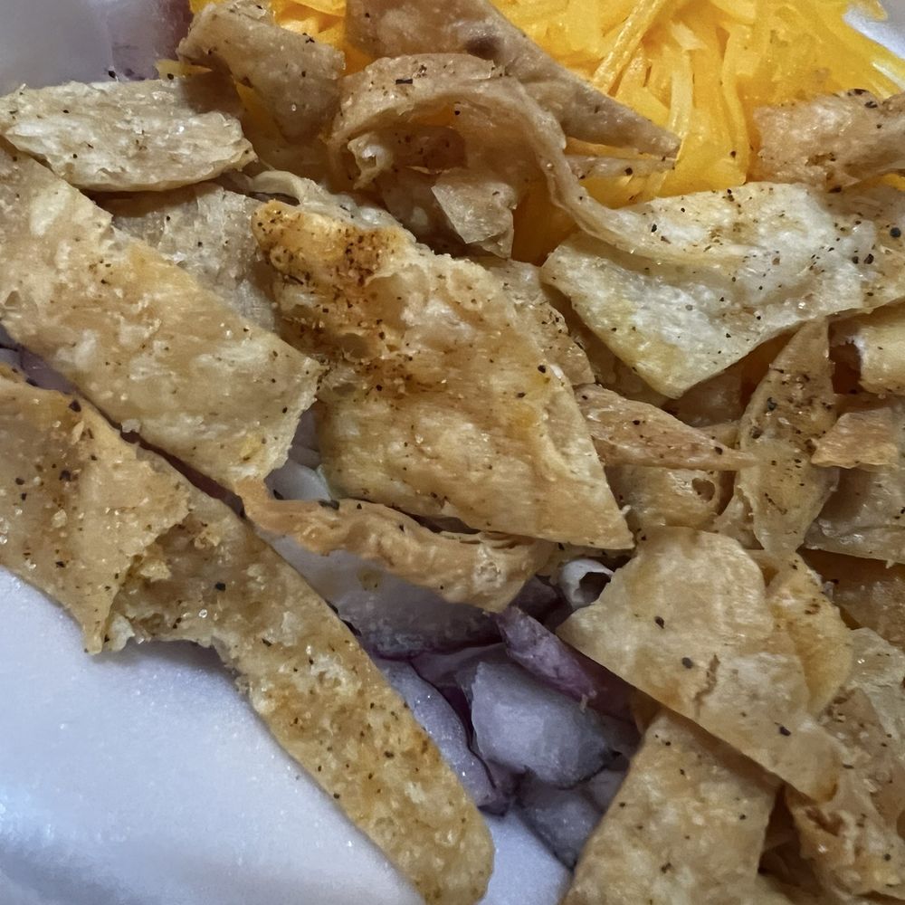 Rebel BBQ - Tortilla chips, red onion, and cheese that came the chili - Barbeque Near Me - Blythe, California Rebel BBQ - Tortilla chips, red onion, and cheese that came the chili - Barbeque Near Me - Blythe, California