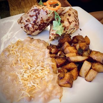 La Parada Cafe - Breakfast burrito with beans and potato hash on the side - Mexican Near Me - Reno, Nevada