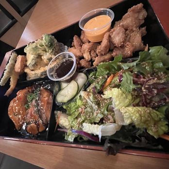 Hello Sushi - 3-item bento. Salmon there was saucy and sesame chicken was dry. - Sushi Bars Near Me - Fullerton, California Hello Sushi - 3-item bento. Salmon there was saucy and sesame chicken was dry. - Sushi Bars Near Me - Fullerton, California