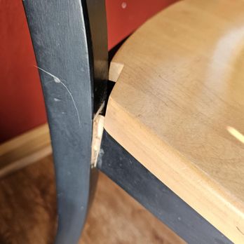 Surf Or Sound Realty - broken chair and a table propped up in hall - Property Management Near Me - Salvo, North Carolina Surf Or Sound Realty - broken chair and a table propped up in hall - Property Management Near Me - Salvo, North Carolina