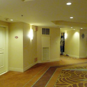 Treasure Island - The door to my room is at the left; there's the work crew at the right, buried in that drywall hole for some reaming and banging at 7am. - Hotels Near Me - Las Vegas, Nevada Treasure Island - The door to my room is at the left; there's the work crew at the right, buried in that drywall hole for some reaming and banging at 7am. - Hotels Near Me - Las Vegas, Nevada