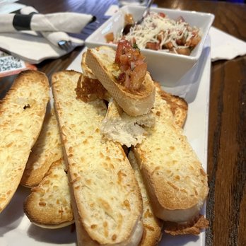 Madison's Restaurant & Bar - Bruschetta and parmesan crostini 5-star flavor @ Madison's (Beddington) - Pizza Near Me - Calgary, Alberta Madison's Restaurant & Bar - Bruschetta and parmesan crostini 5-star flavor @ Madison's (Beddington) - Pizza Near Me - Calgary, Alberta