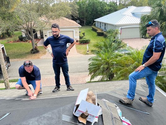 Fleming Roofing and Construction Logo