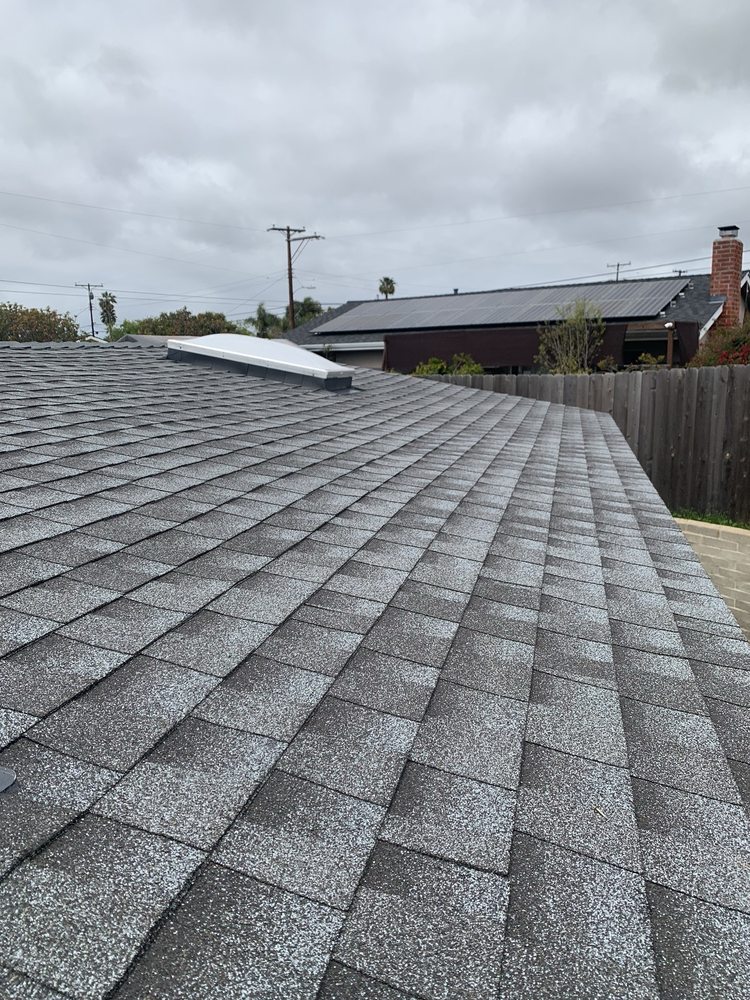 Slide of Mo's Professional Roofing