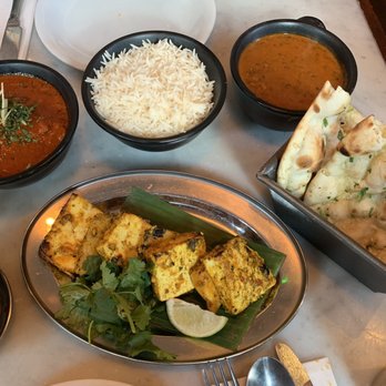 Dishoom - Chicken Ruby (back left moving clockwise), basmati rice, Black House Daal, Garlic Naan, Paneer Tikka - Indian Near Me - London, XGL Dishoom - Chicken Ruby (back left moving clockwise), basmati rice, Black House Daal, Garlic Naan, Paneer Tikka - Indian Near Me - London, XGL