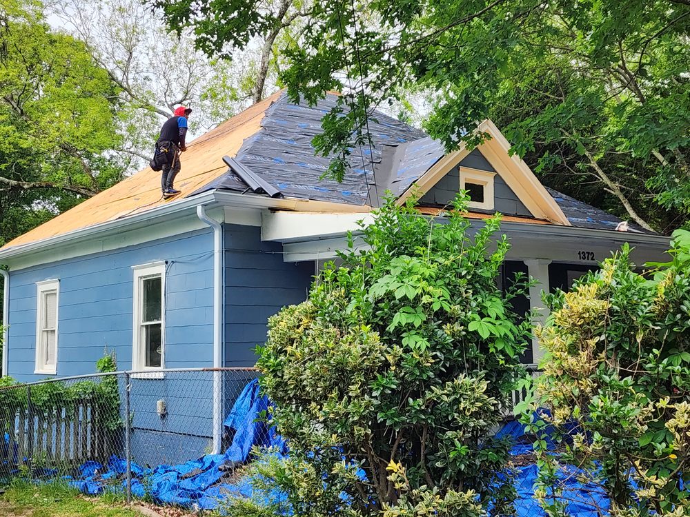 Slide of The Roofing Specialists