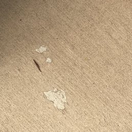 Chip in concrete supposed to be fixed with coating. Chip in concrete supposed to be fixed with coating.