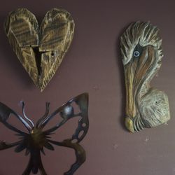 Pink Alligator Gallery - Cypress heart and a Pelican.