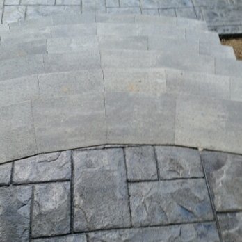American Design & Contracting - a close up of a walkway - Masonry/Concrete Near Me - Albany, New York