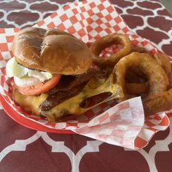 Alcova Lakeside Marina - Delicious fat bacon cheeseburger with very tasty onion rings. Onion rings are two dollar up charge. But worth it.
