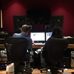 My friend and Jules doing whatever sound guys do. My friend and Jules doing whatever sound guys do.