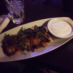 The Jazz Room - Perogies with pork belly and microgreens