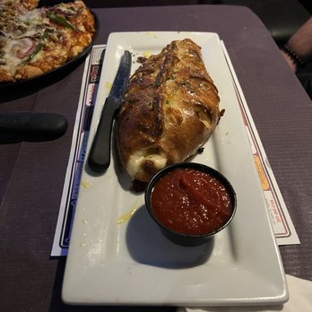 Famous Monster Pizza - The Scorpion King Chicken Parmesan Roll - Pizza Near Me - Decatur, Indiana Famous Monster Pizza - The Scorpion King Chicken Parmesan Roll - Pizza Near Me - Decatur, Indiana