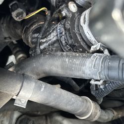 Tunex - South Jordan - Before photo of dirty hoses, leaks and some corrosion...