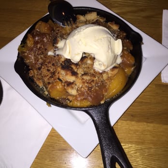 The Flipside Restaurant - Peach Cobbler with buttery crust, burnt sugar, and ice cream - Southern Near Me - Rock Hill, South Carolina The Flipside Restaurant - Peach Cobbler with buttery crust, burnt sugar, and ice cream - Southern Near Me - Rock Hill, South Carolina