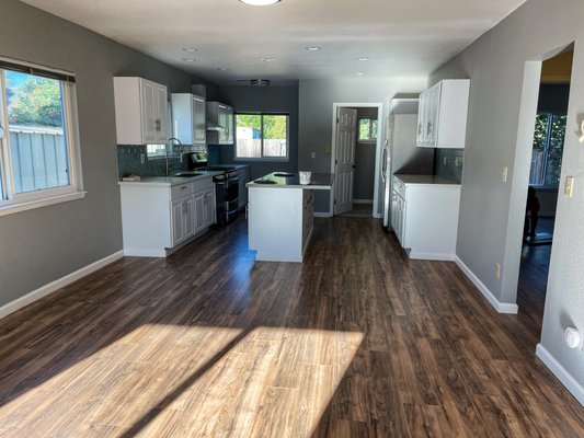 Laminate Flooring House Kitchen Renovation - This was a laminate flooring installation done for the renovation of the House Kitchen. Laminate Flooring House Kitchen Renovation - This was a laminate flooring installation done for the renovation of the House Kitchen.