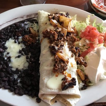 Tacos Mexicanos - The Burrito Cubano, a tasty and filling combination of steak, pork, and bacon topped with chorizo, queso, and pineapple. - Mexican Near Me - Macedonia, Ohio Tacos Mexicanos - The Burrito Cubano, a tasty and filling combination of steak, pork, and bacon topped with chorizo, queso, and pineapple. - Mexican Near Me - Macedonia, Ohio