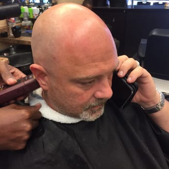 Razor King Barber Shop - Working while he's shaved! - Barbers Near Me - Houston, Texas Razor King Barber Shop - Working while he's shaved! - Barbers Near Me - Houston, Texas