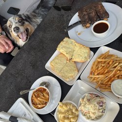 Alex Bar-B-Q - -1/2 rack beef ribs -cheesy bread -Mac n cheese - chili beans -slaw -skinny fries