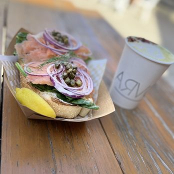 Arvo Café - To the right is my wife's matcha lavender latte and the food is the smoked salmon toast. - Cafes Near Me - Honolulu, Hawaii