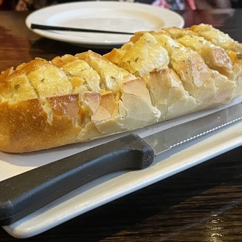 Delicious Steakhouse - Complimentary garlic bread that comes with every dinner. - Steakhouses Near Me - Orleans, Ontario Delicious Steakhouse - Complimentary garlic bread that comes with every dinner. - Steakhouses Near Me - Orleans, Ontario