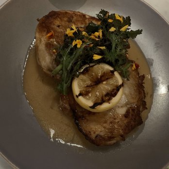 Sofia - Half chicken with lemon butter sauce and spicy greens - Italian Near Me - New Orleans, Louisiana