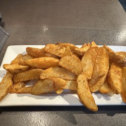 Lloyd's Bar & Grill - Cajun wedges