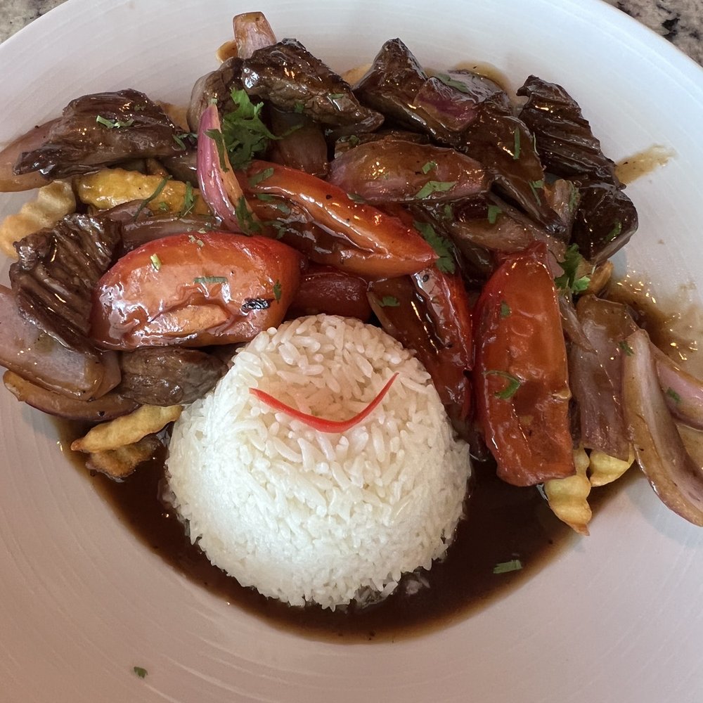 Lomo saltado ~$18