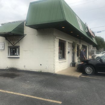 Hog Heaven - a woman standing outside of a restaurant - Salad Near Me - Dyersburg, Tennessee