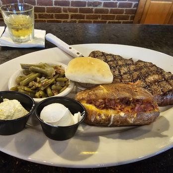 Abe's Hideout - Ribeye with loaded baked potato and green beans - American Near Me - Springfield, Illinois Abe's Hideout - Ribeye with loaded baked potato and green beans - American Near Me - Springfield, Illinois