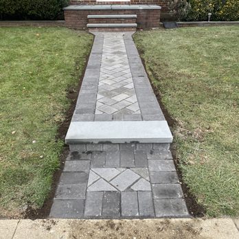 Jose Landscaping & Construction - Sister's herringbone walkway with new bluestone on the steps. - Landscaping Near Me - Westbury, New York Jose Landscaping & Construction - Sister's herringbone walkway with new bluestone on the steps. - Landscaping Near Me - Westbury, New York