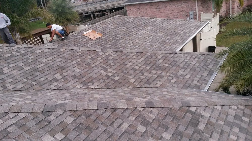 Slide of Brennan's Roofing