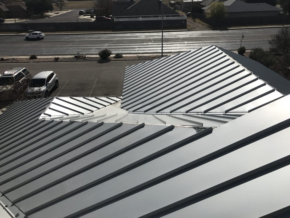 Slide of LG Roofing and Contracting