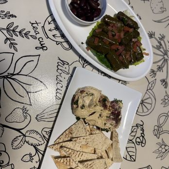 Yucca Kabob - Hummus & pita (toasted and sliced for serving) and grape leaves with smoked Kalamata olives (purchased separately from a different business) - Middle Eastern Near Me - Yucca Valley, California Yucca Kabob - Hummus & pita (toasted and sliced for serving) and grape leaves with smoked Kalamata olives (purchased separately from a different business) - Middle Eastern Near Me - Yucca Valley, California
