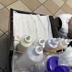 Top Nails - Inside establishment showing cleaning is not a priority at this establishment.