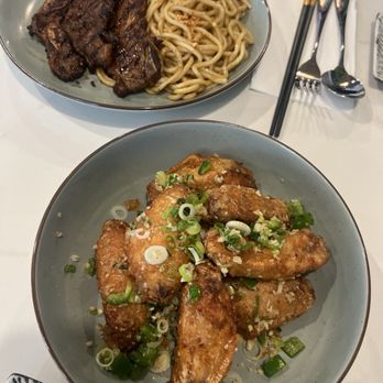 Four Seasons - Vietnamese Kitchen - 5 spice wings and galbi short ribs with garlic noodles - Vietnamese Near Me - Reno, Nevada Four Seasons - Vietnamese Kitchen - 5 spice wings and galbi short ribs with garlic noodles - Vietnamese Near Me - Reno, Nevada