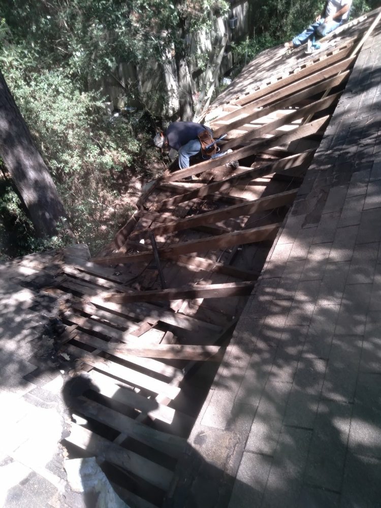 Slide of J&K Roofing Company