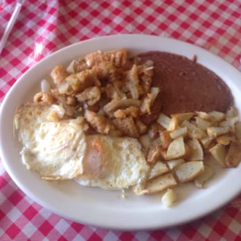 Rosies Diner - Chicharrones in salsa plate w/two eggs. Yum! - Mexican Near Me - Uhland, Texas