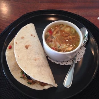 Grits Cafe - Butter bean white chicken chili and House made Andouille, jalapeño jack soft tacos. - Southern Near Me - Forsyth, Georgia
