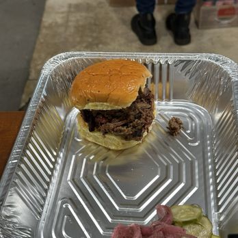 Smokemade Meats + Eats - Brisket sandwich, in house made pickled onions and pickles - Barbeque Near Me - Orlando, Florida Smokemade Meats + Eats - Brisket sandwich, in house made pickled onions and pickles - Barbeque Near Me - Orlando, Florida